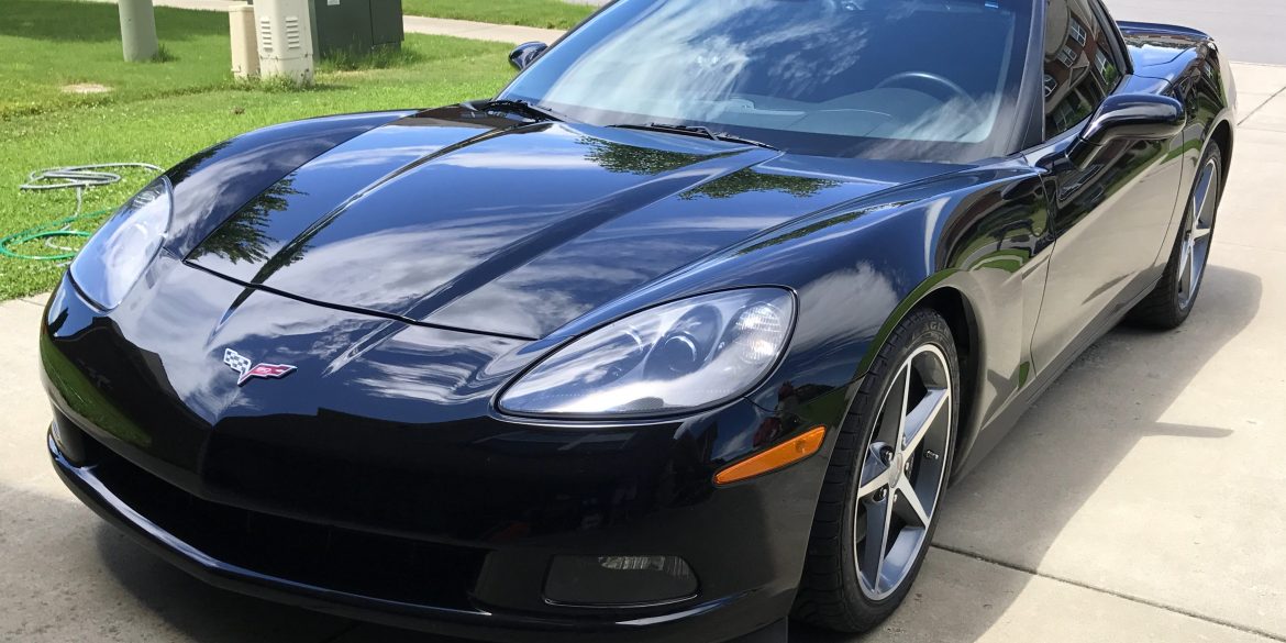 Scott Kolecki, content writer and Corvette enthusiast, preps his car for "Drive Your Corvette To Work" Day on Friday, June 30, 2017.