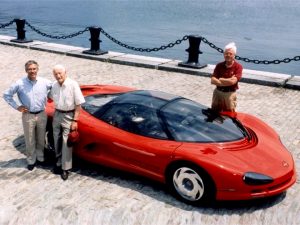 Dave McLellan, Arkus-Duntov, and David Hill surround a concept car