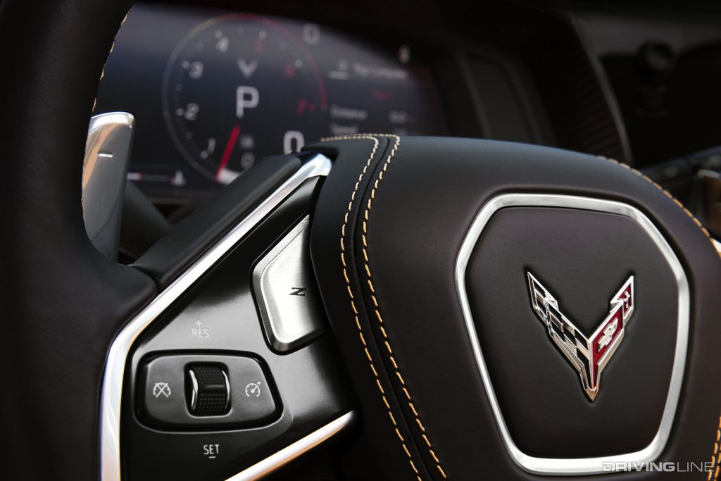 The 2020 Mid-Engine Corvette Stingray features paddle shifters that provide the driver with shift control over the car's automatic transmission. Also, please note the "Z" button on the steering wheel as well as the yellow-stitching on the steering wheel. Both of these are options available to consumers when purchasing a new C8 Corvette.