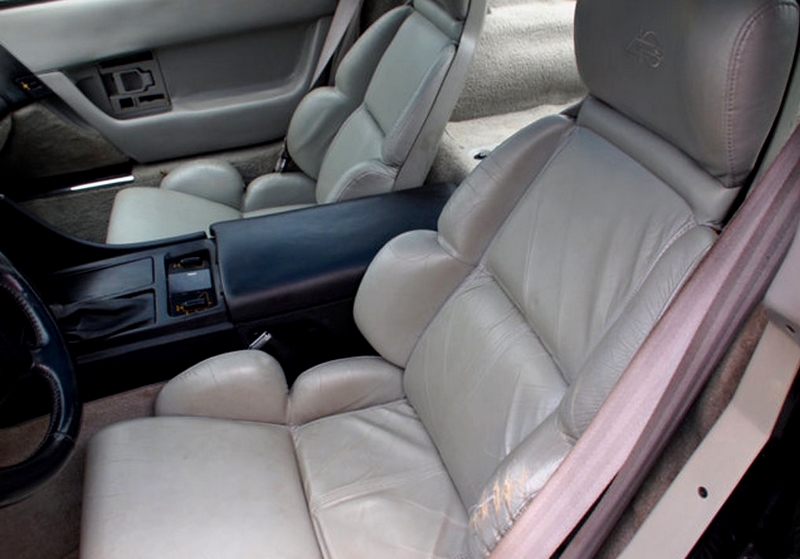 Note the worn siide bolster on this 1993 Corvette's driver seat. While this is an obvious example, looking closely for wear in the seats can prevent expensive repairs to the leather seat covers.