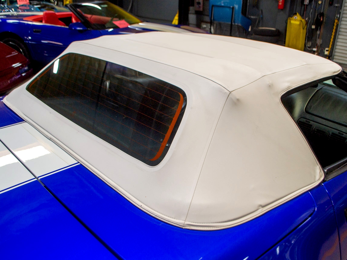 Note the condition of this convertible top - while it should be expected on a low-mileage car like this, the condition of the top is all the more impressive because it has retained its factory white color.