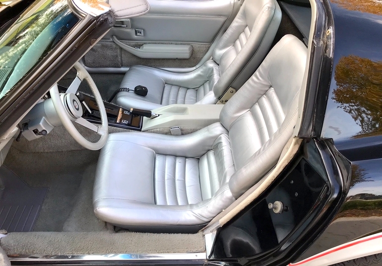 Interior of a 1978 Corvette Pace Car in silver.