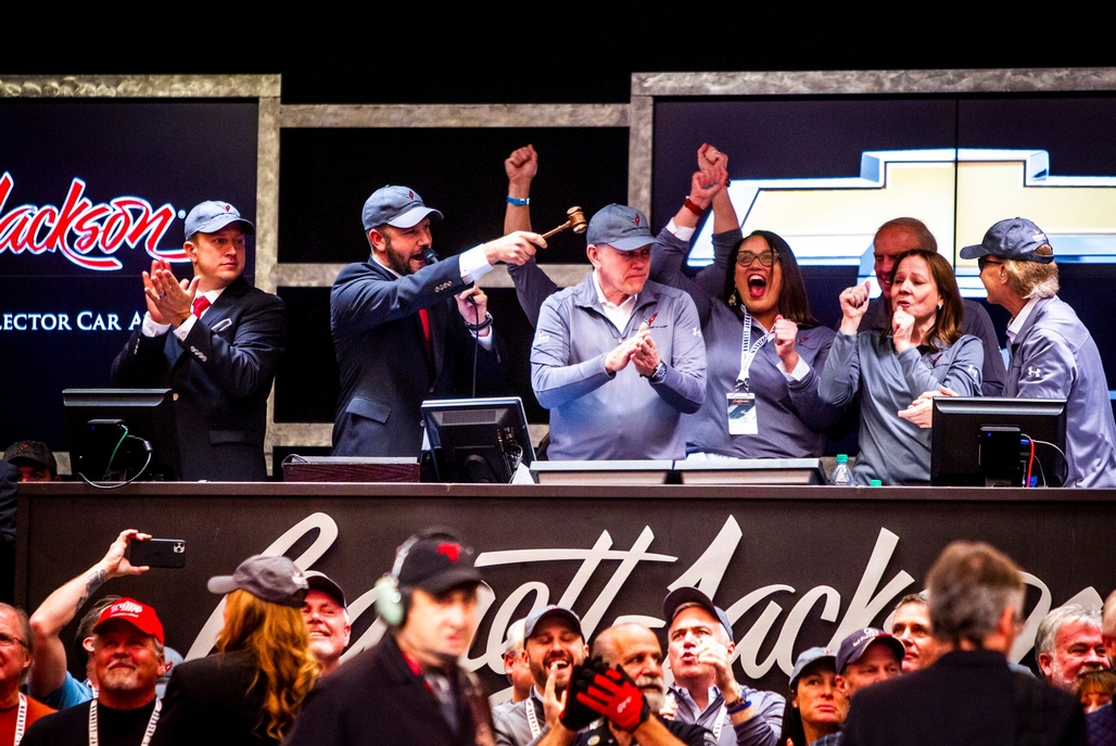 Craig Jackson (CEO of Barrett-Jackson (left)), Tonya Allen (President/CEO of Detroit Children's Foundation), Mary Barra (Chair and CEO of General Motors) and Steve David (President of Barrett-Jackson) celebrate as the bids for the 2020 Mid-Engine Corvette reach $3 MILLION DOLLARS.