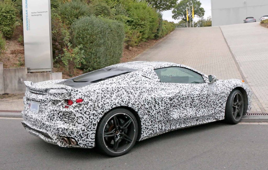 Spy photo of a C8 Corvette test-mule pulling into a GM testing center.