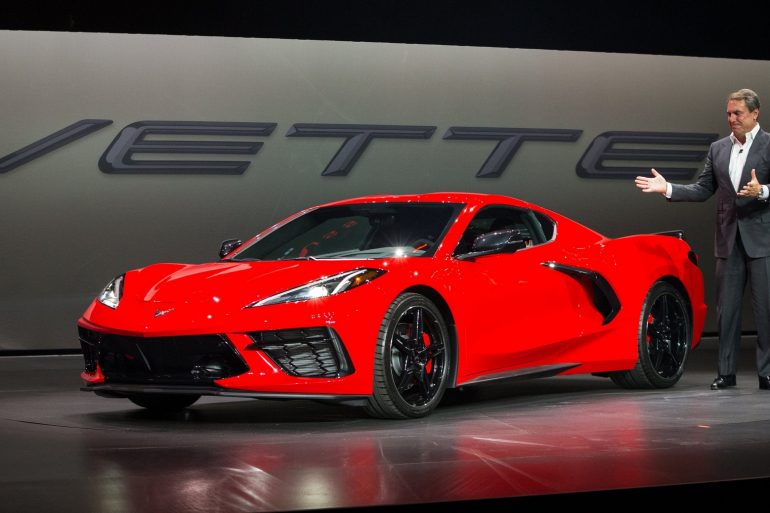 General Motors President Mark Reuss drives the 2020 Chevrolet Corvette Stingray onto the stage during its unveiling Thursday, July 18, 2019 in Tustin, California. The 2020 Stingray, the brands first-ever production mid-engine Corvette, features a new 6.2L Small Block V-8 LT2 engine producing 495 horsepower and 470 lb-ft of torque when equipped with performance exhaust. The 2020 Chevrolet Corvette Stingray goes into production in late 2019 and will start under $60,000. (Photo by Dan MacMedan for Chevrolet)