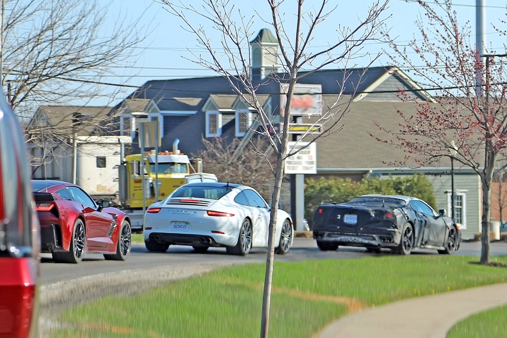 A Mid-Engine Corvette test mule, a C7 Corvette Coupe and a Porsche 911 are spotted during a testing session in May, 2018.