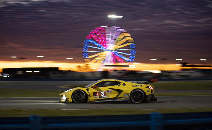 The No. 3 C8.R Corvette running at Daytona near dusk.