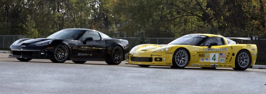 The 2006 Corvette C6RS next to its racing counterpart, the C6.R Corvette.