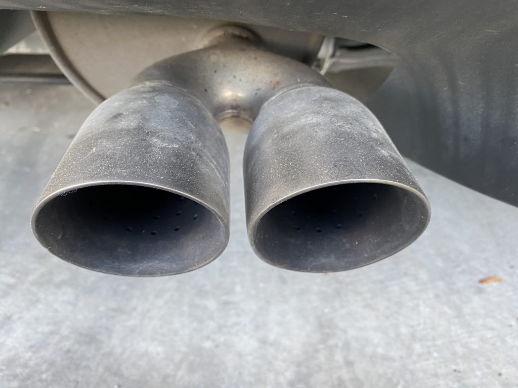 The exhaust tips on my 2013 Corvette coupe from normal driving (I average about 6,000 miles per year on this car.)