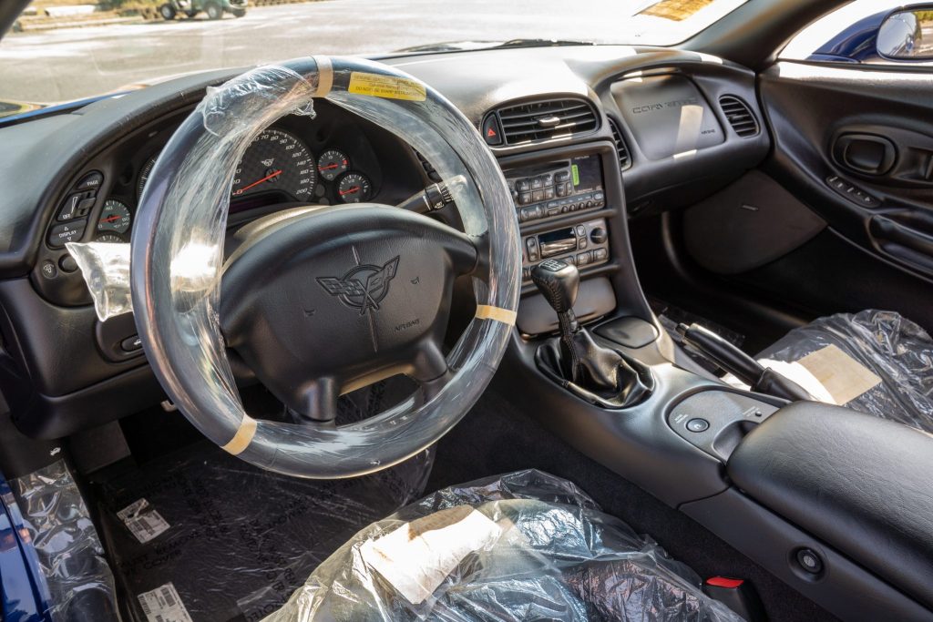 This car's interior has never been unpackaged from the factory.