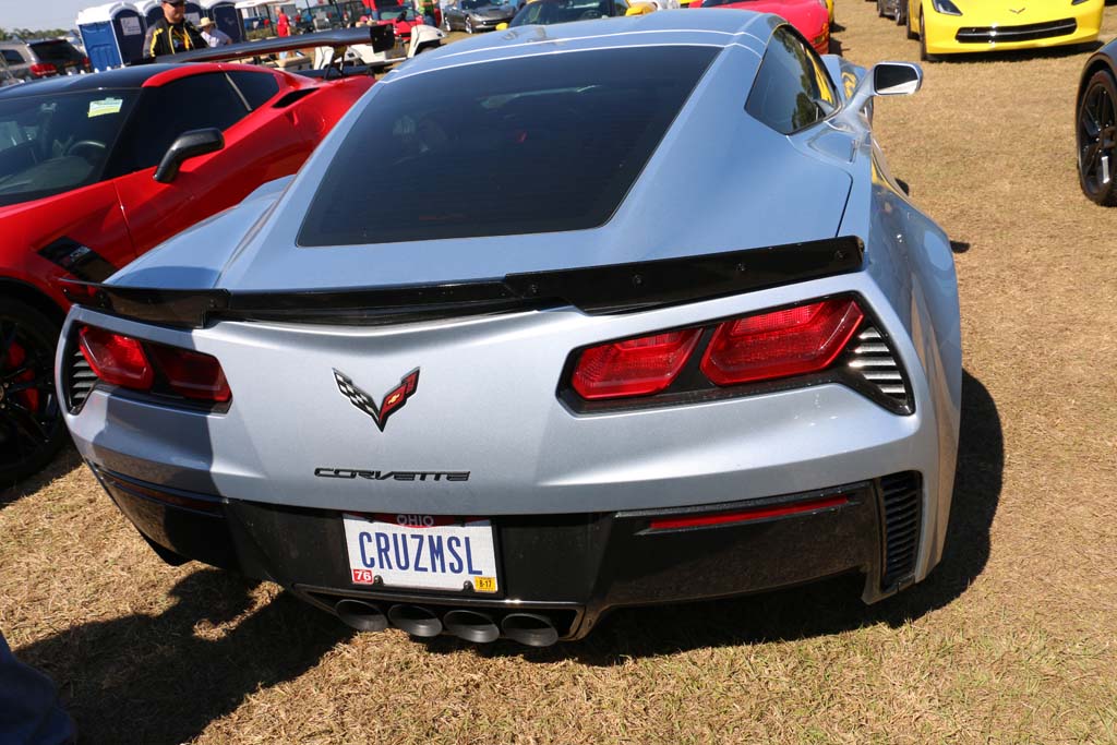 Silver C7 corvette with custom plate