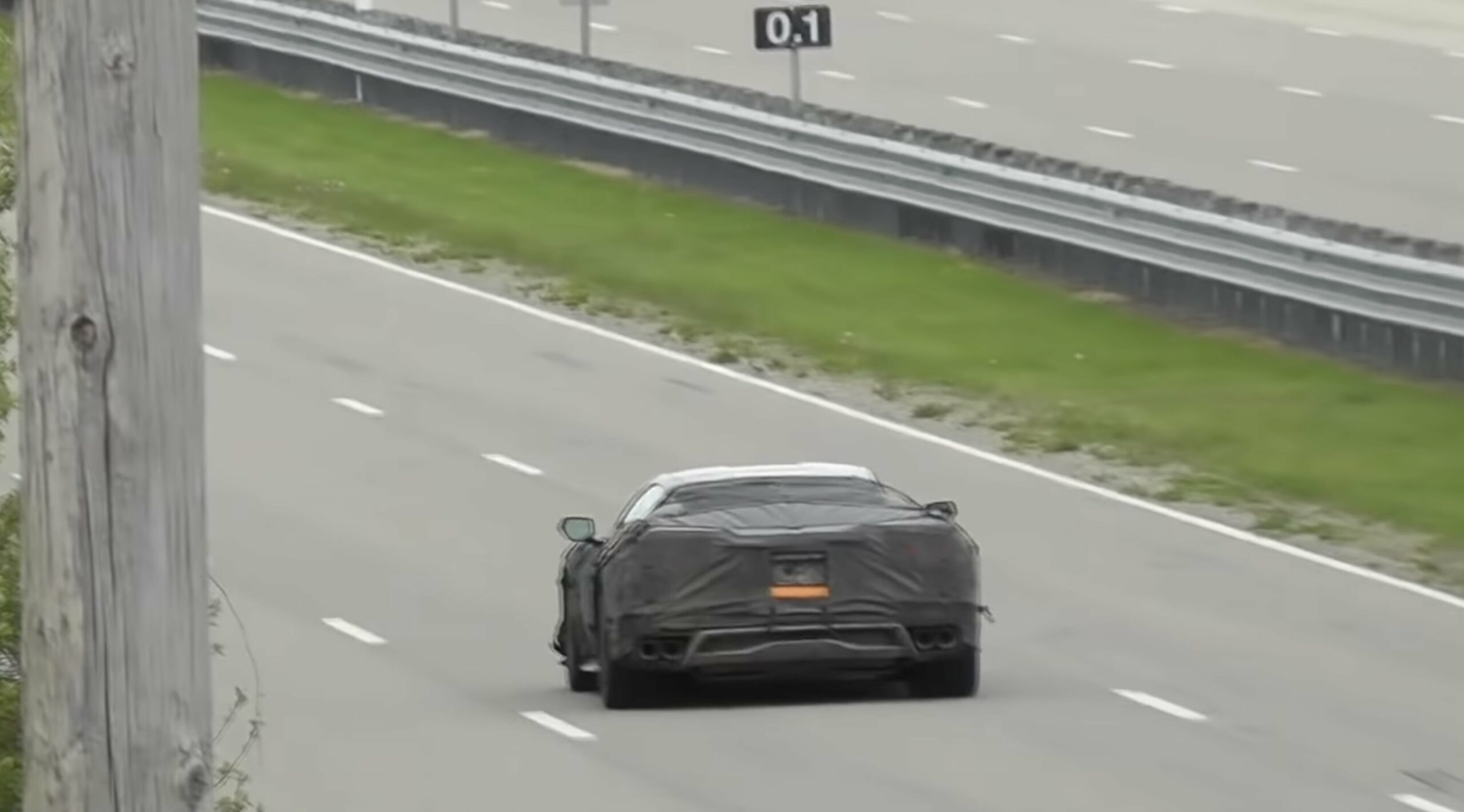 A back view of a new Corvette - possibly the 2023 C8 Z06