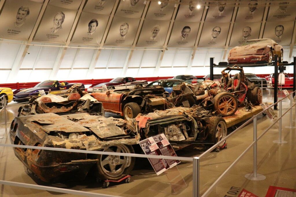 The sinkhole Corvettes on display in the restored rotunda at the National Corvette Museum. The Mallett Hammer Z06 is to the right in this image.