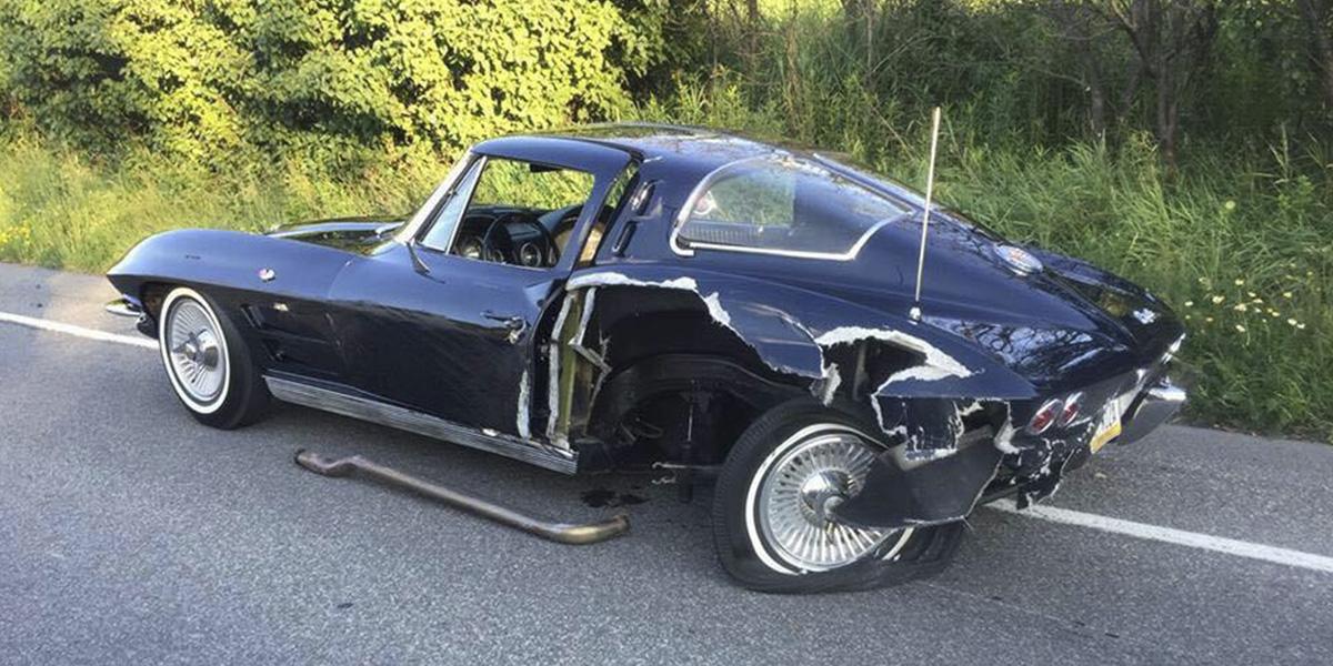 Black 1965 Chevrolet Corvette Stingray wrecked