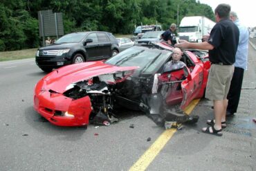 Red C5 Chevrolet Corvette crash