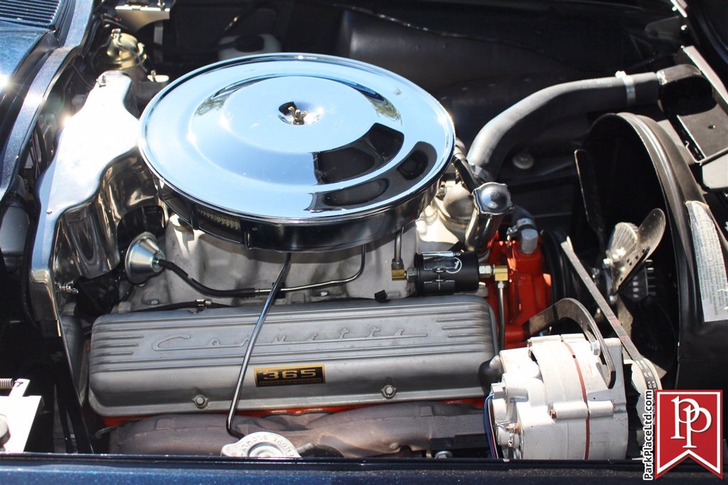 Close-up of 1964 L76 Engine in open hood with Corvette branding