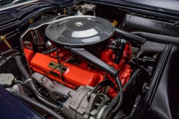 1963 5.4L 327CI Engine in open hood of C2 Corvette