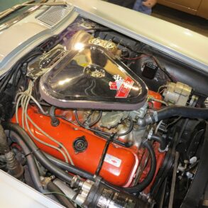 1967 L68 427CI engine in open hood of white C2 Corvette