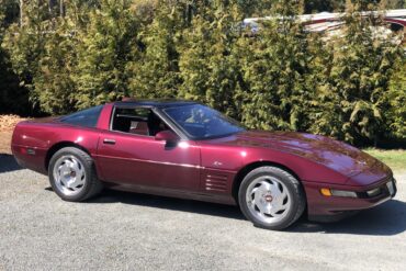 Red 1993 Corvette C4 ZR-1 40th Anniversary Edition parked on street