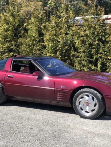 Red 1993 Corvette C4 ZR-1 40th Anniversary Edition parked on street