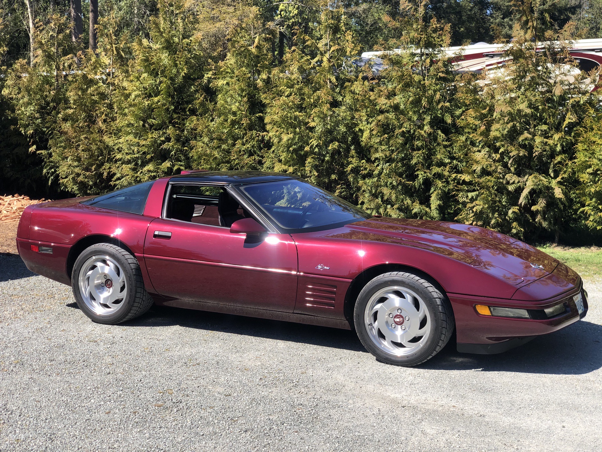 Red 1993 Corvette C4 ZR-1 40th Anniversary Edition parked on street