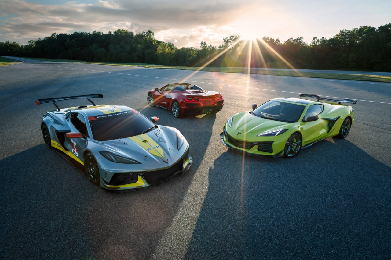 From left to right: The 2023 C8.R Corvette Race Car, the 2023 Corvette Z06 convertible, and the 2023 Corvette Z06 coupe.
