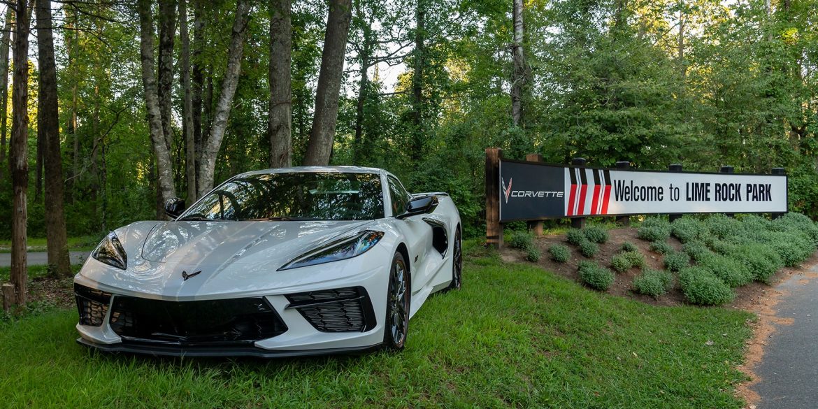 C8 Corvette parked next to Lime Rock Park Signage
