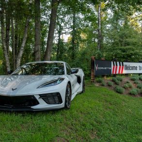 C8 Corvette parked next to Lime Rock Park Signage