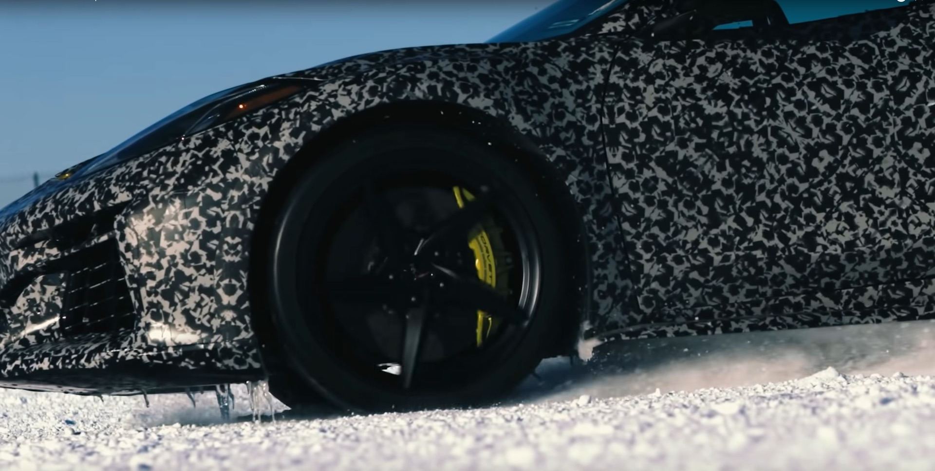 Front wheel of C8 E-Ray Corvette throwing up snow