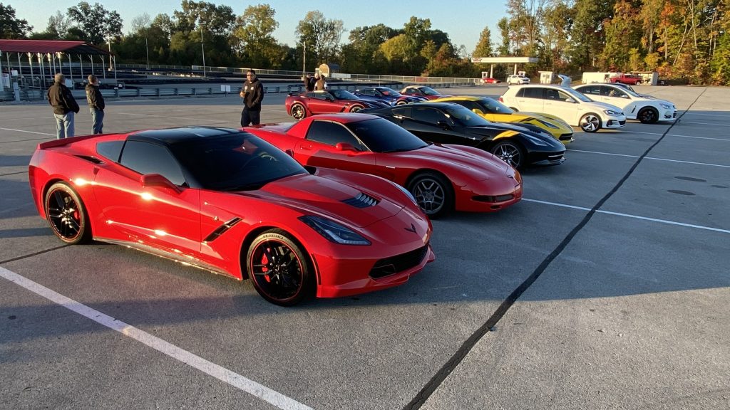 An assortment of cars arriving at the NCM Motorsports Park for the HPDI track day on October 10, 2022.