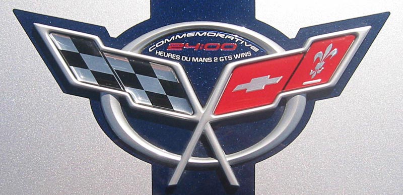 A special edition hood emblem was created for the 2004 24 Hours of Le Mans Commemorative Edition Corvette that included the annotation "Commemorative 24:00 Heures du Mans 2 GTS Wins"