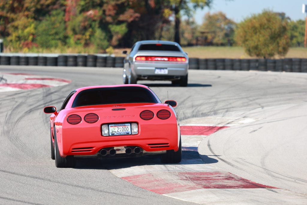 Whether an older Corvette, a Dodge Challenger, or even a Ford Mustang (not pictured), the NCM Motorsports Park welcomes drivers of all makes and models to put their car to the test on their 3.2-mile, 23 turn racetrack. (Image courtesy of ABI Photography.)