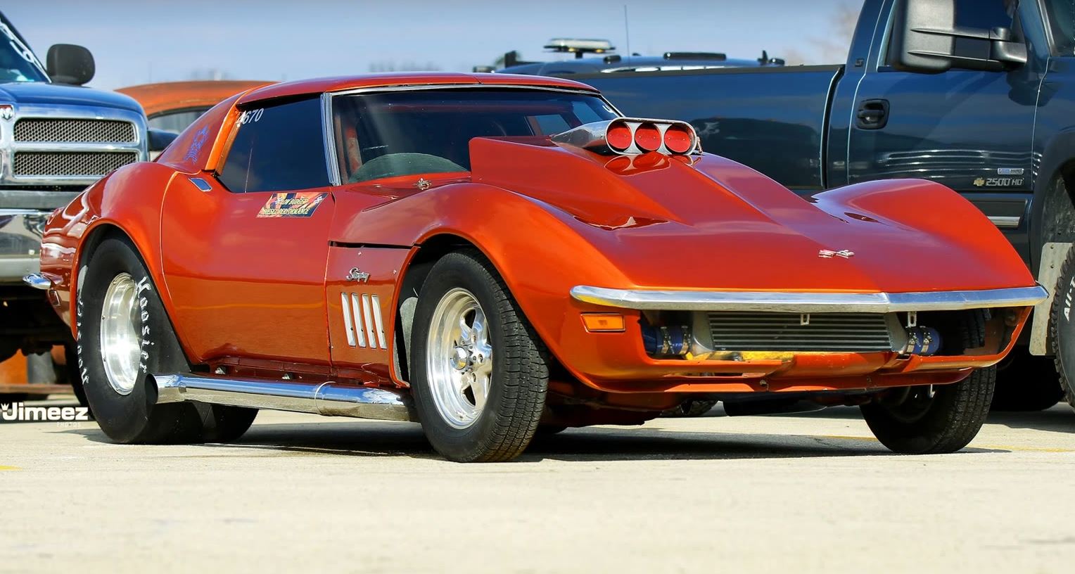 Orange Chevrolet C3 Corvette drag car with Cummins swap