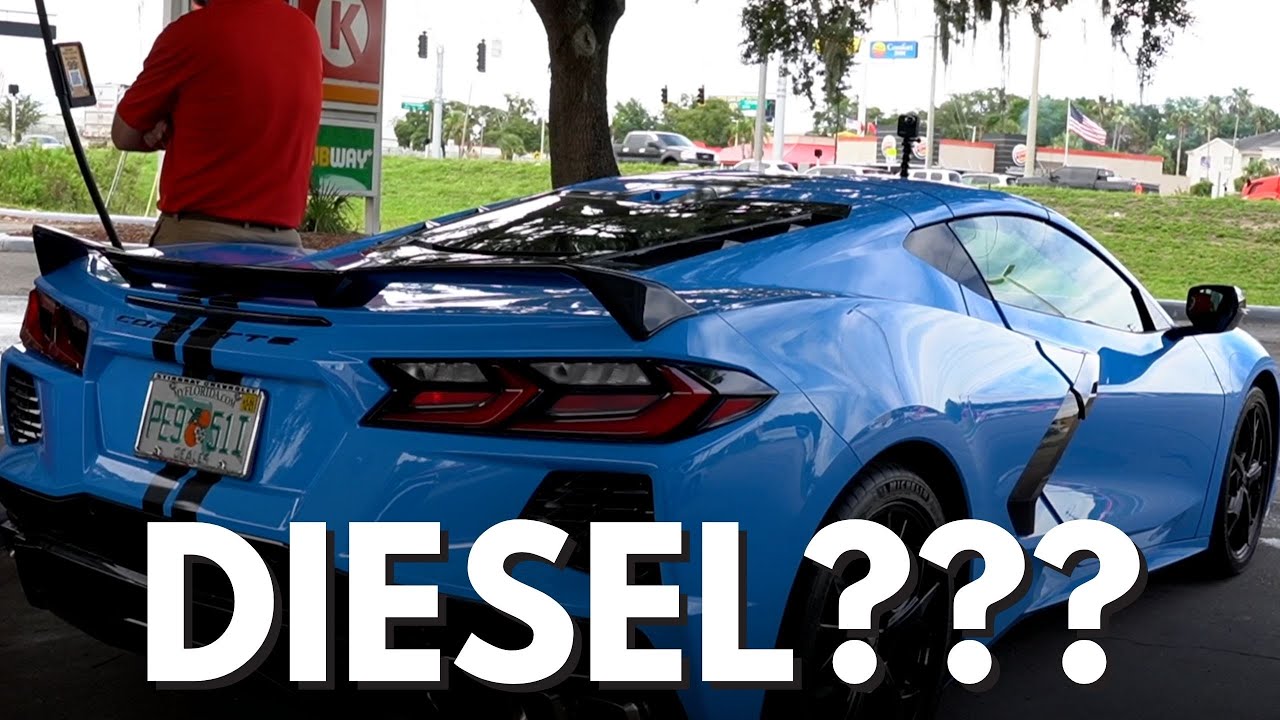 blue C8 Chevrolet Corvette getting filled with diesel