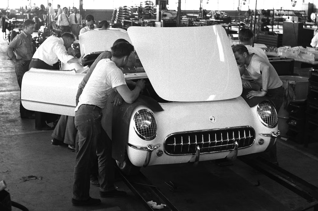 one of the first generation Corvettes being assembled at the factory.