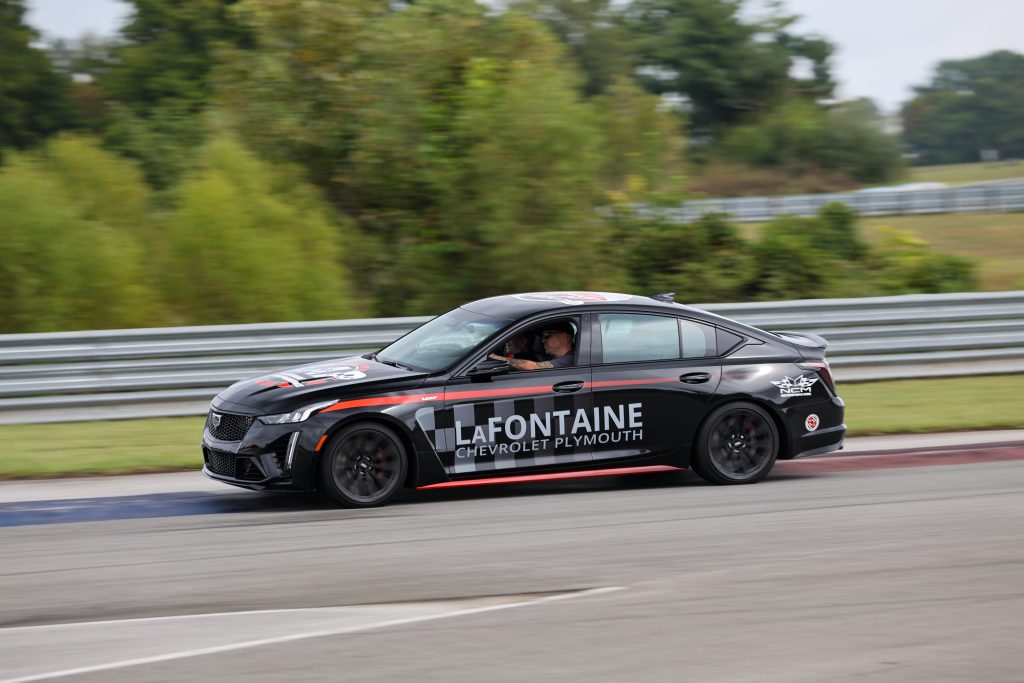 The Cadillac Blackwing was a lot of fun to experience on the racetrack - we can't recommend the experience enough, and we encourage you to contact the NCM Motorsports Park today to book your experience in this awesome car. Despite experiencing some understeering and body roll, the Cadillac Blackwing is an incredibly capable "track car", which is all the more impressive given the level of comfort built into this car Preparing to take the 2024 Cadillac CT5-V Blackwing out on the NCM Motorsport Park racetrack for tour laps. (Image courtesy of Cole Carroll/NCM Motorsports Park.)