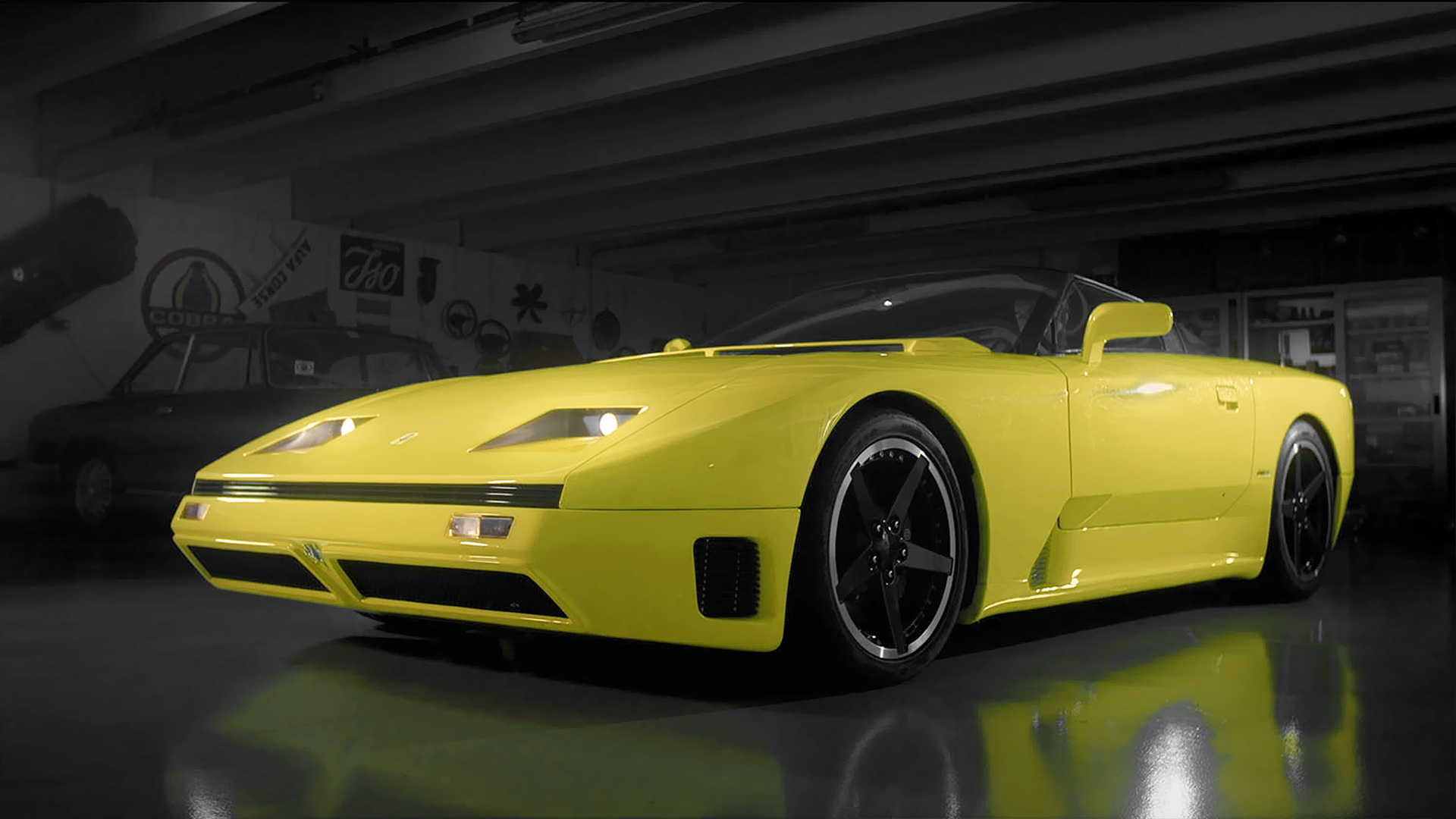 Three-quarter side view of a yellow Iso Rivolta Grifo 90