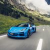 Front view of a 2025 Corvette E-Ray with mountain background