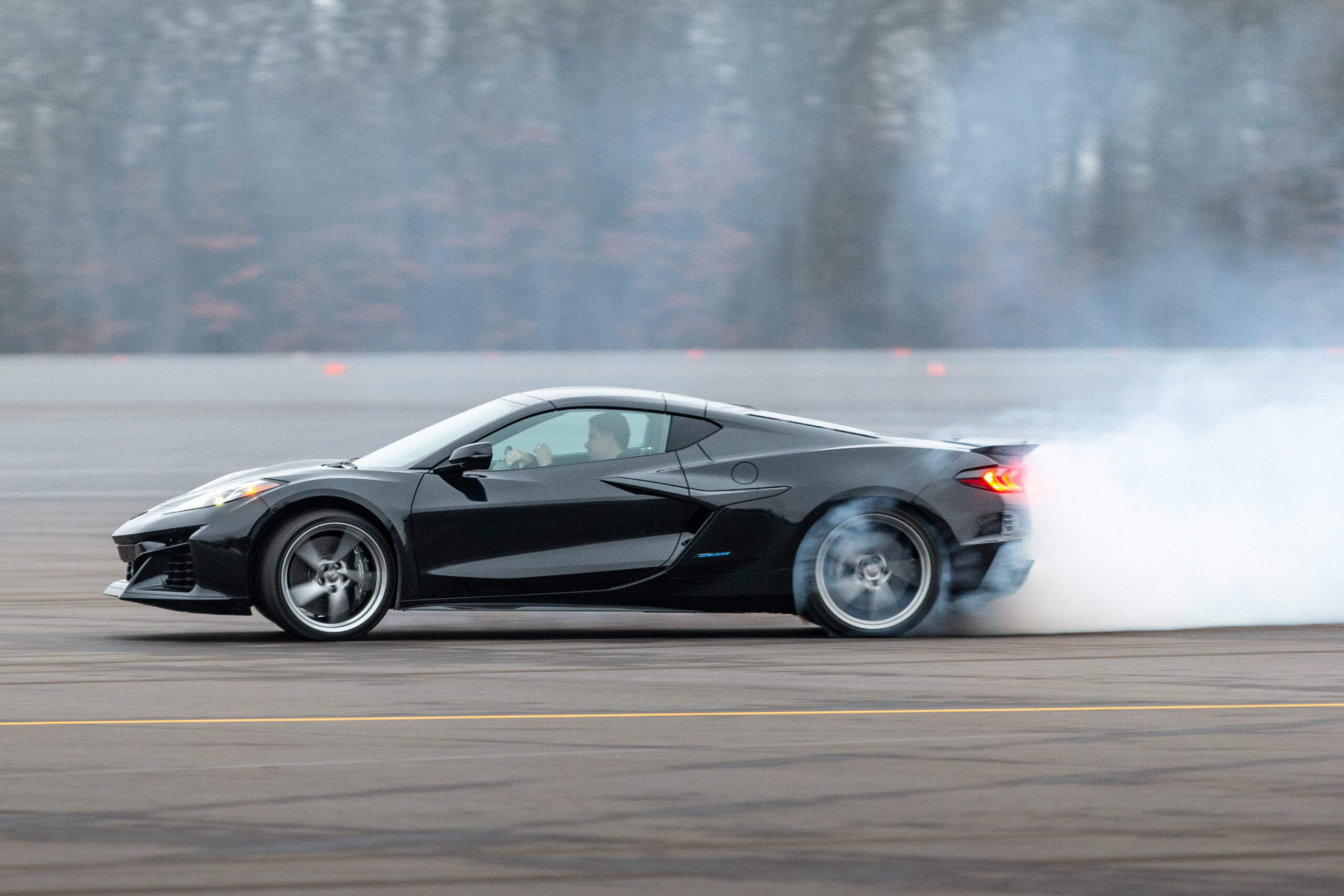 Black Corvette E-Ray doing a burnout