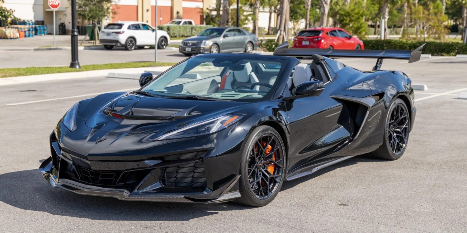 Black Z06 Corvette for sale at a parking lot