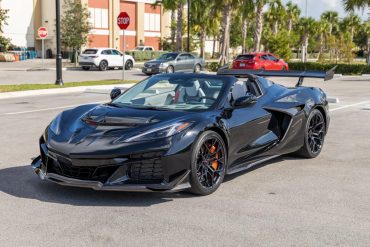 Black Z06 Corvette for sale at a parking lot